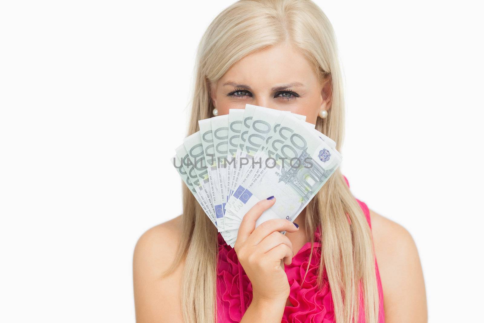 Beauty holding 100 euros banknotes against white background