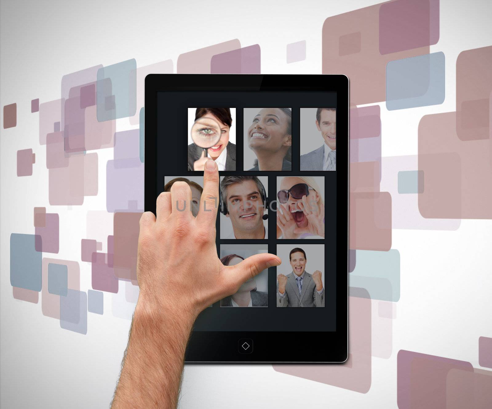 Hand pointing on tablet pc showing photos on digital background