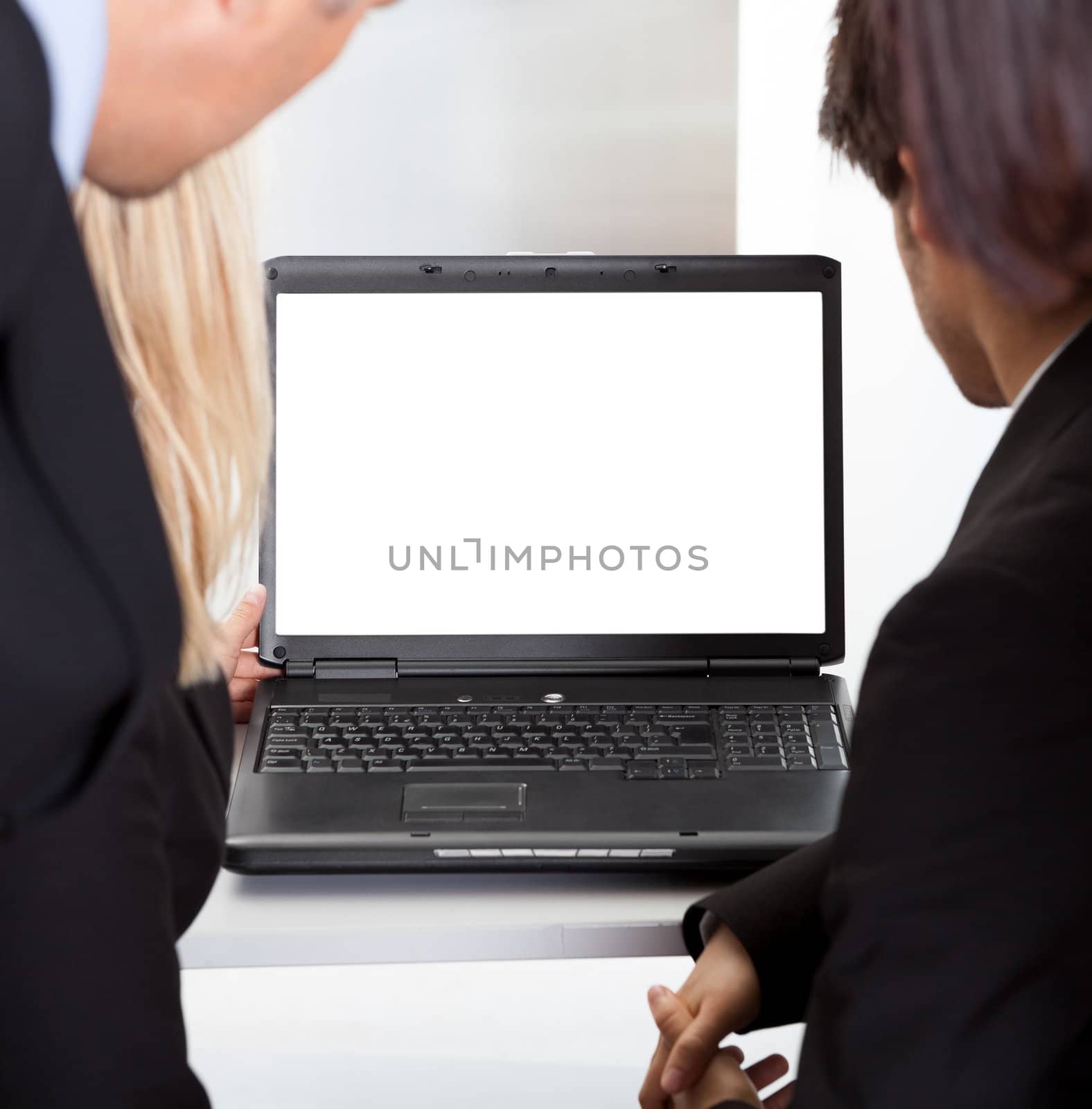 Business people looking at the empty monitor screen