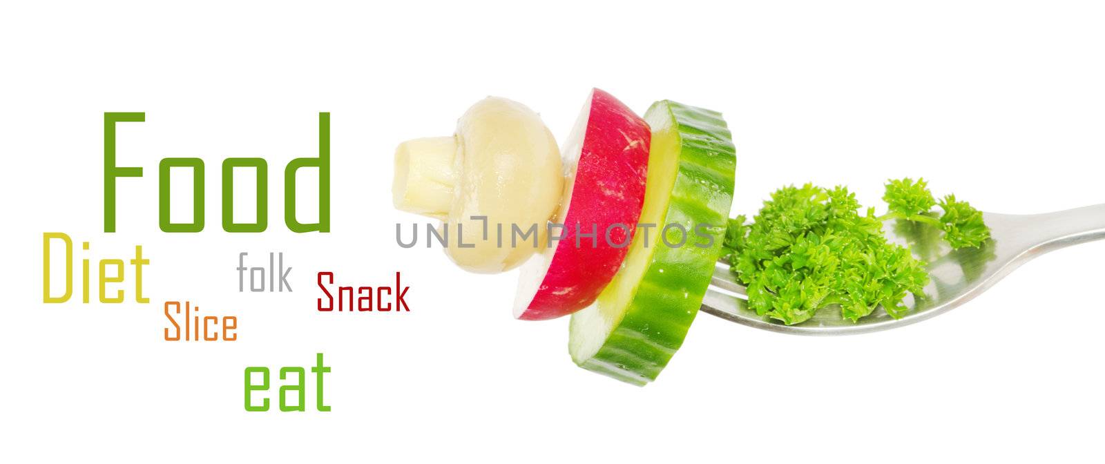 Fresh vegetables on a fork isolated on white background