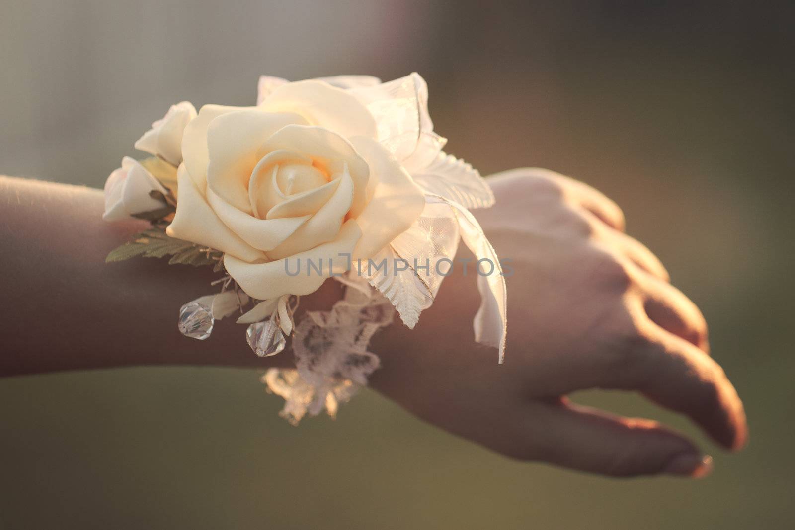 Flower on hand of the bridesmaids at the wedding