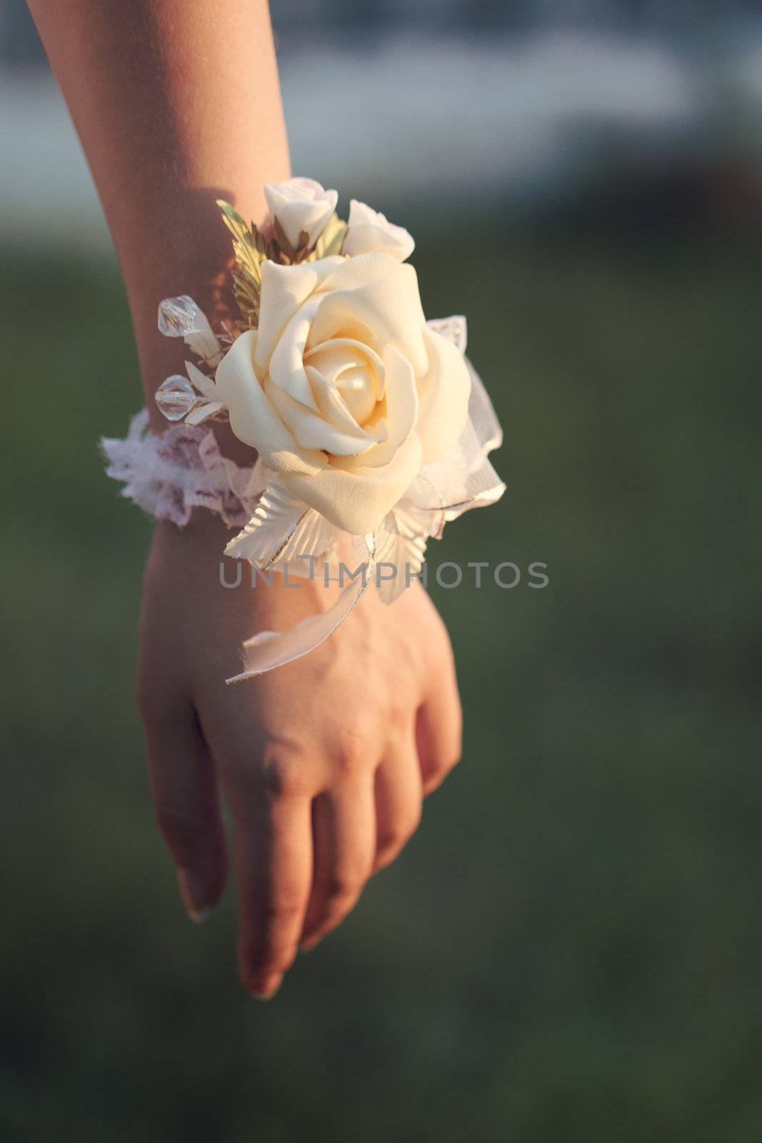 Flower on hand of the bridesmaids at the wedding