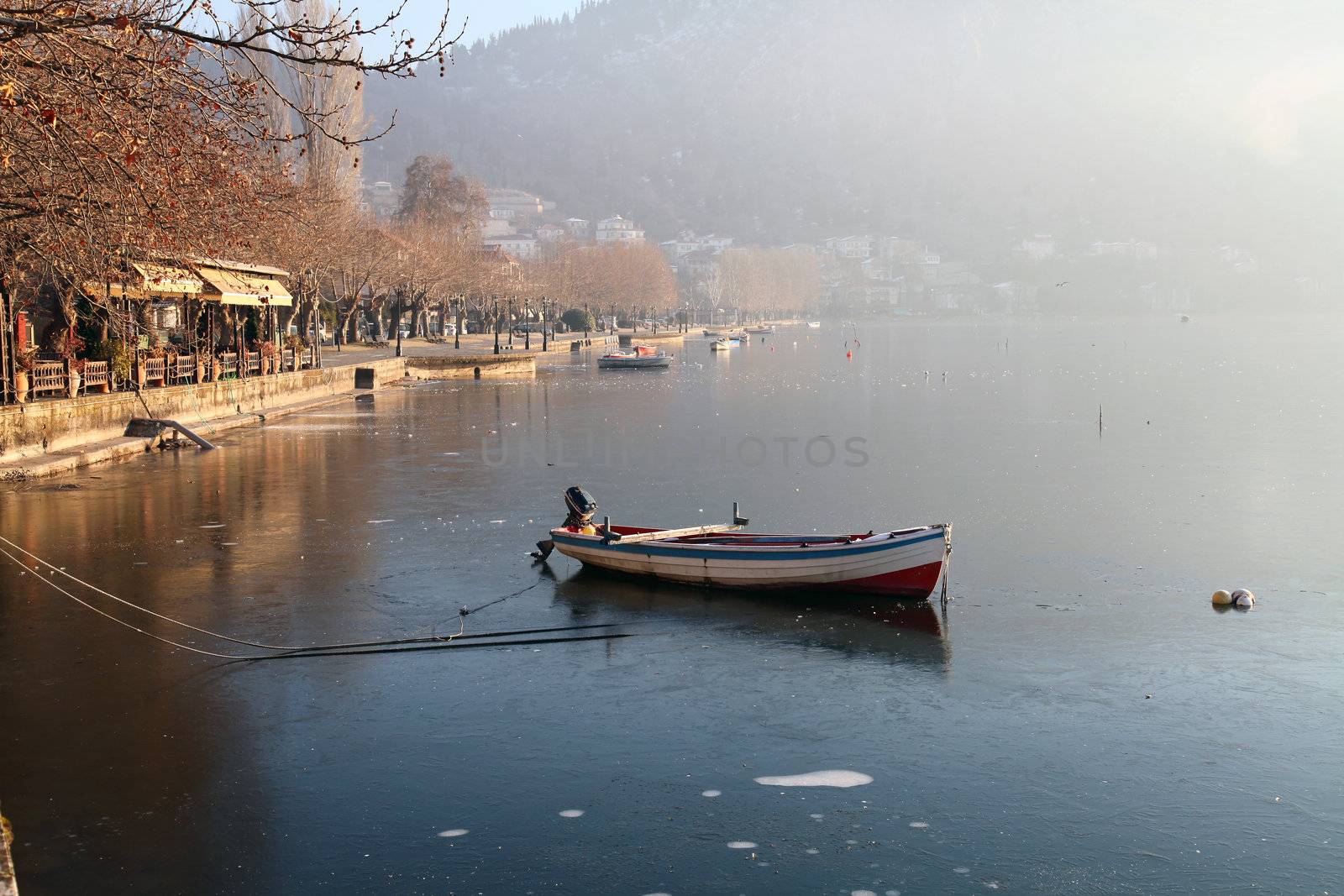 Boat in the lake by smixiotis_dimitrios