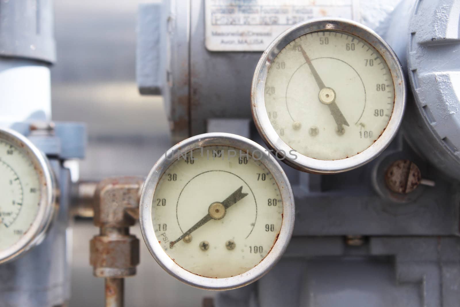Old pressure gage in industrial plant