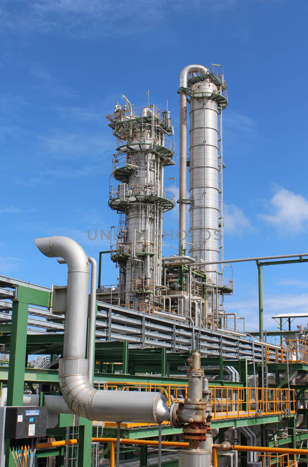 Industrial plant with blue sky , Eastern of Thailand August 2012