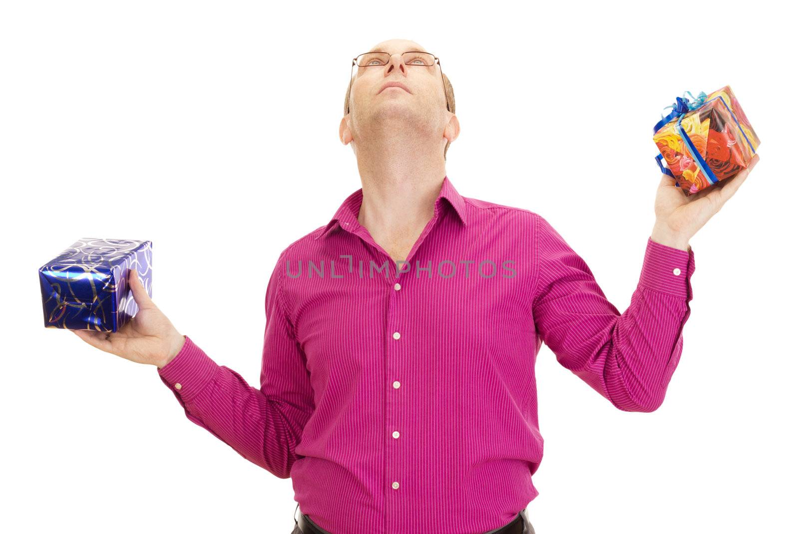 A business person juggling with two colorful gifts