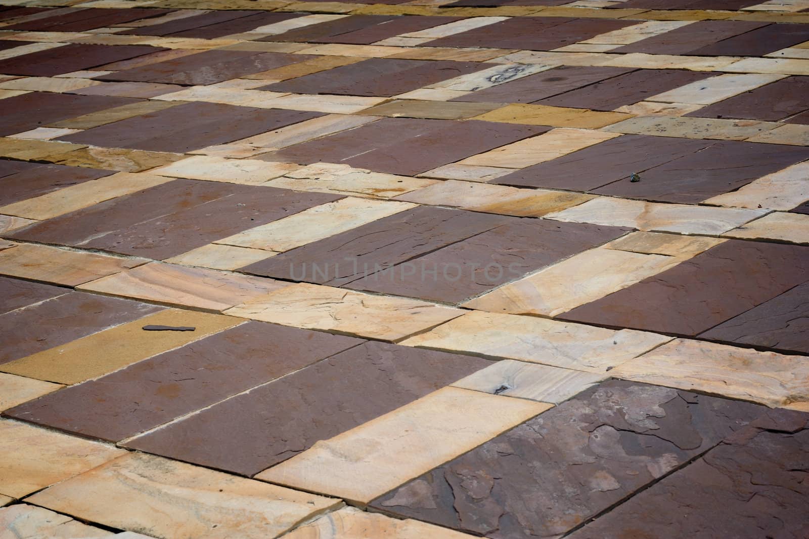 Pavement made of stone tile pattern.