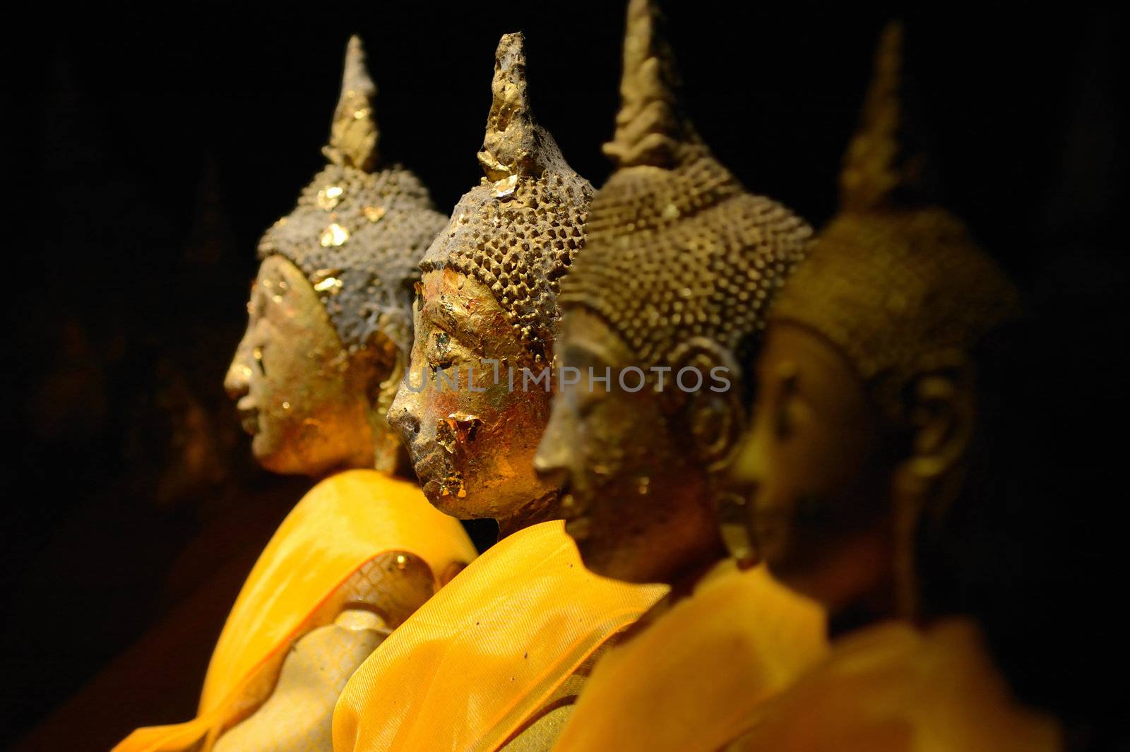 The light on the older Buddha in Wat Tham Khao Luang Phetchauri, Thailand. Photo taken on:December 4th, 2011.