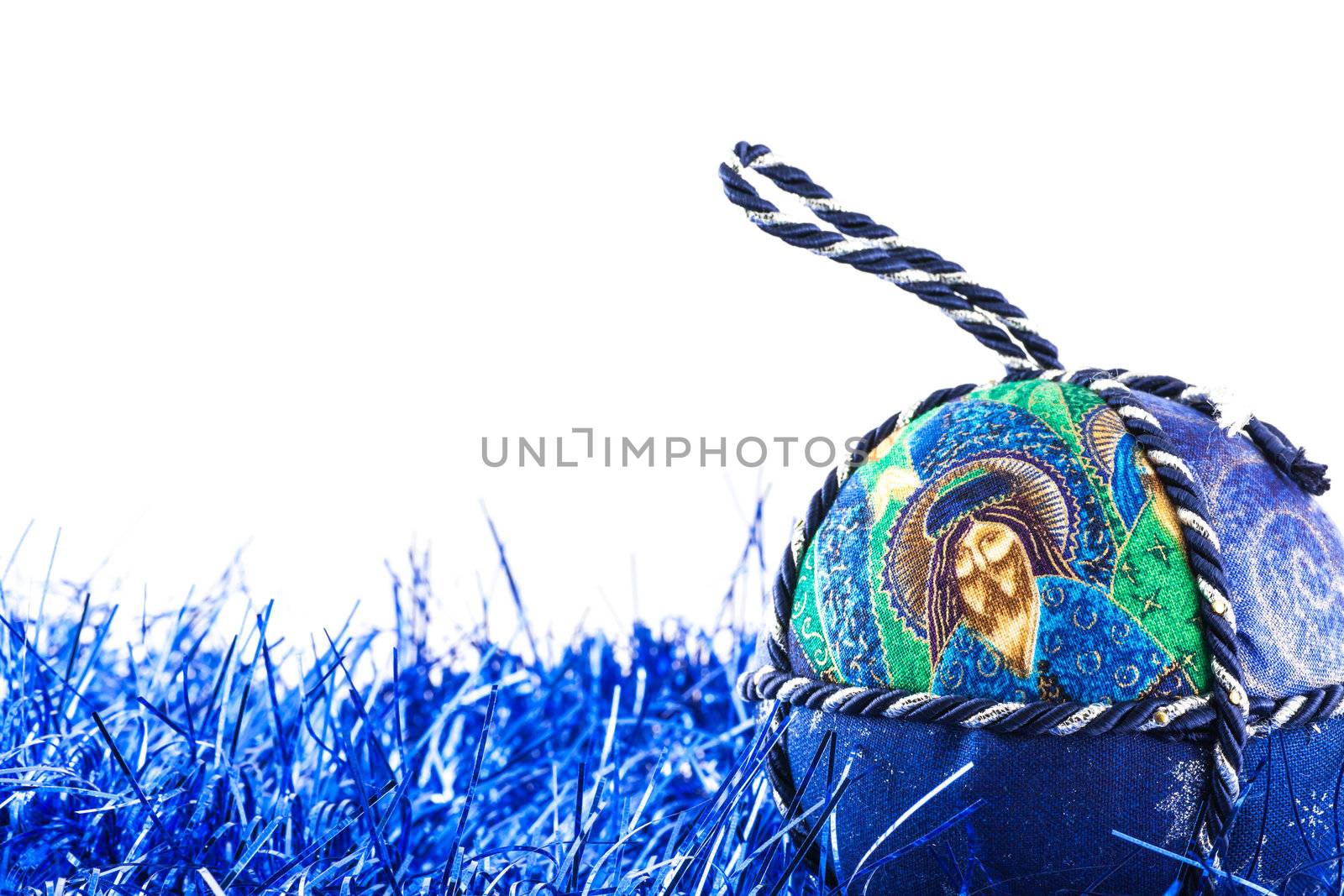 Italy. Traditional handmade Christmas ball made of white and blue fabric