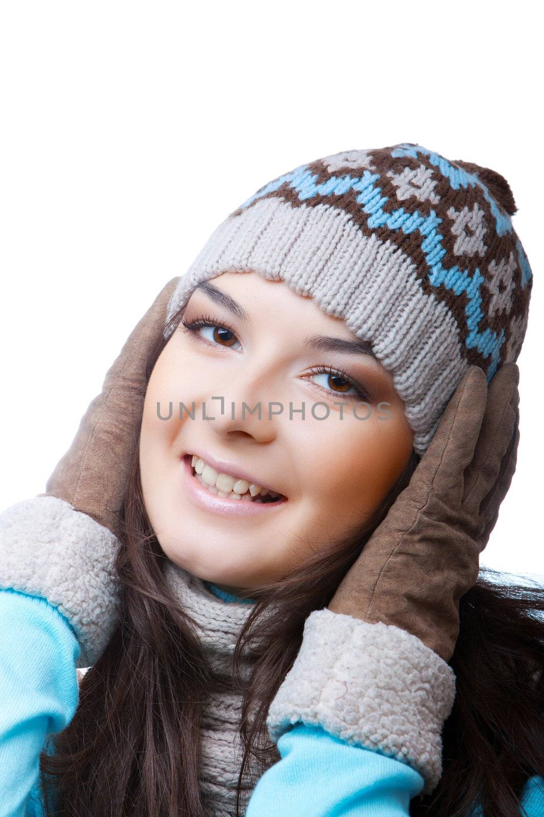 woman in a cap and in winter gloves on an isolated background