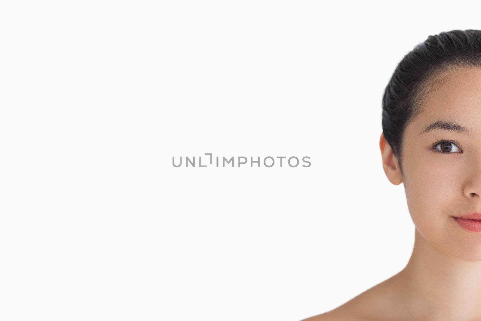 Black haired woman looking natural by Wavebreakmedia