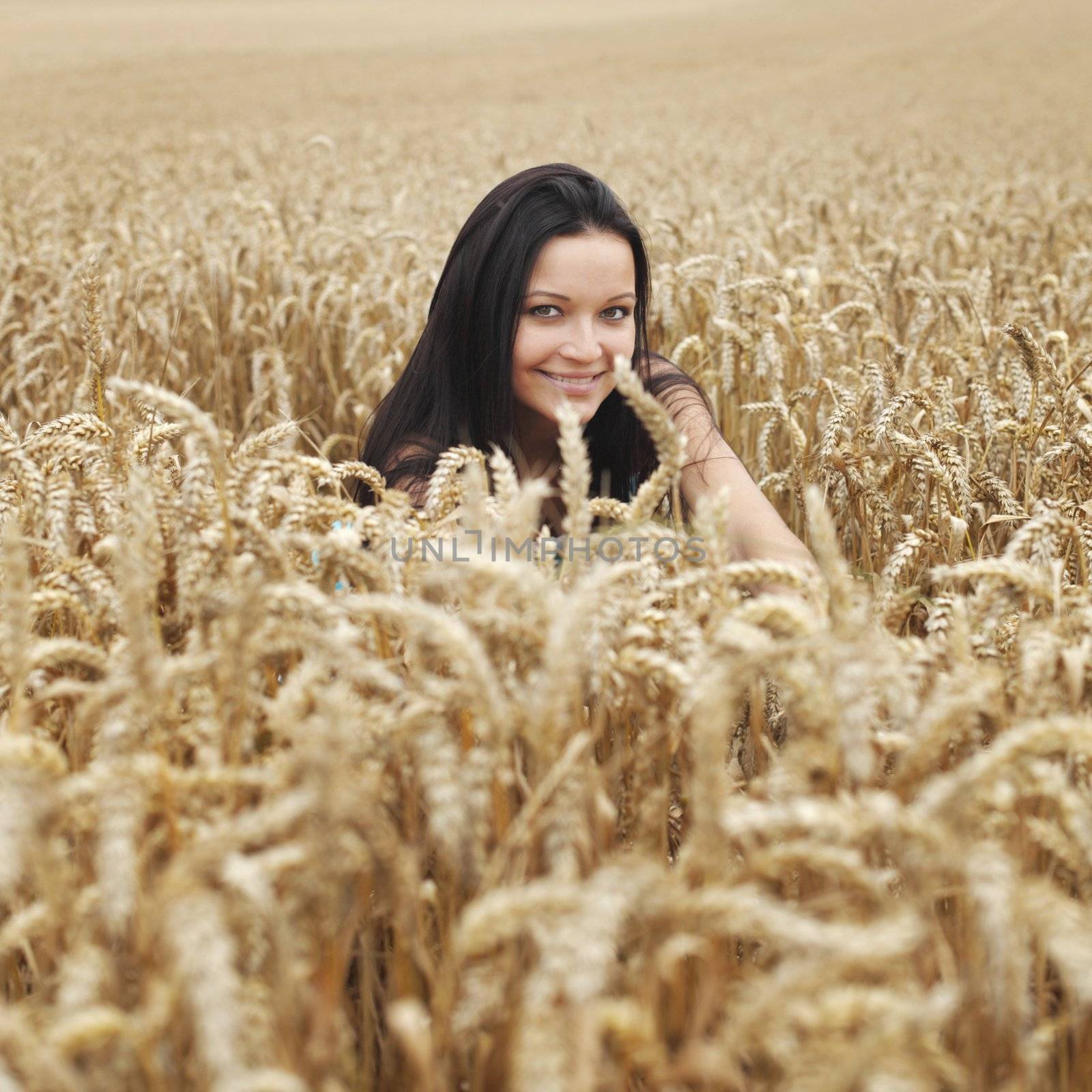 woman on wheat field by Yellowj