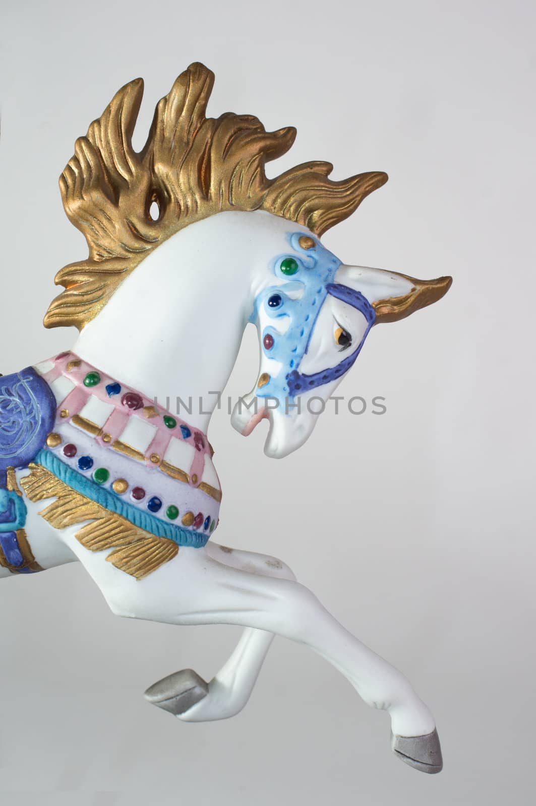 Colorful carousel horse isolated on white background