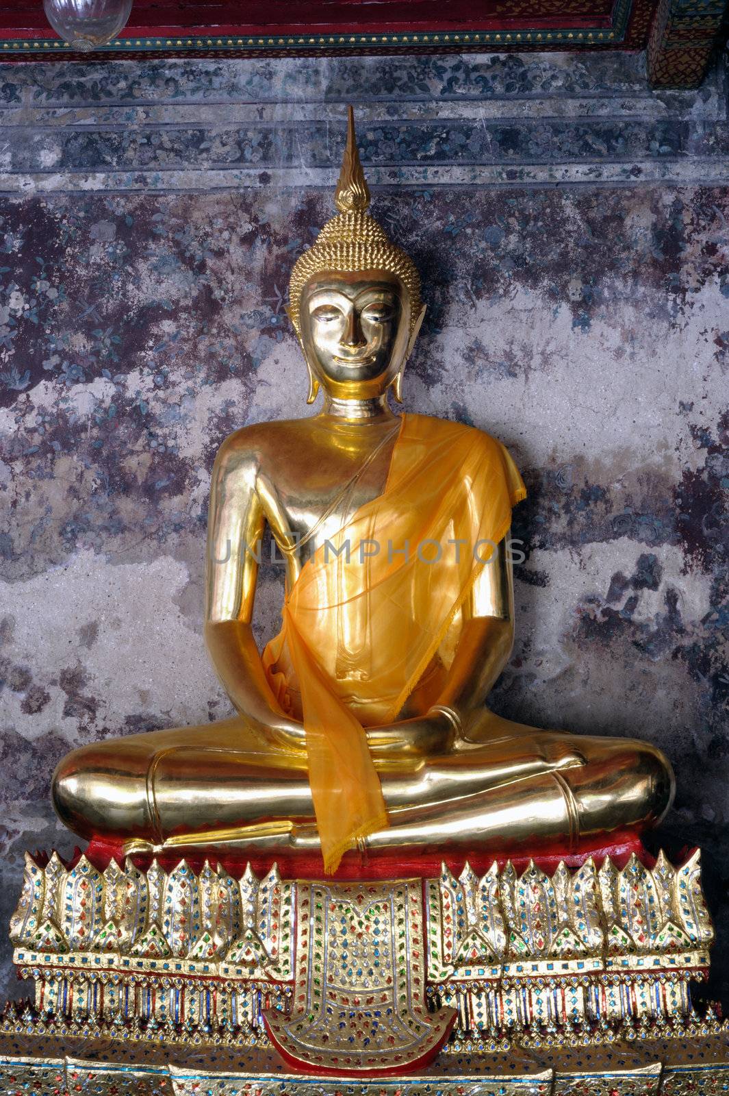 Gold Buddha statue in Thai temple.