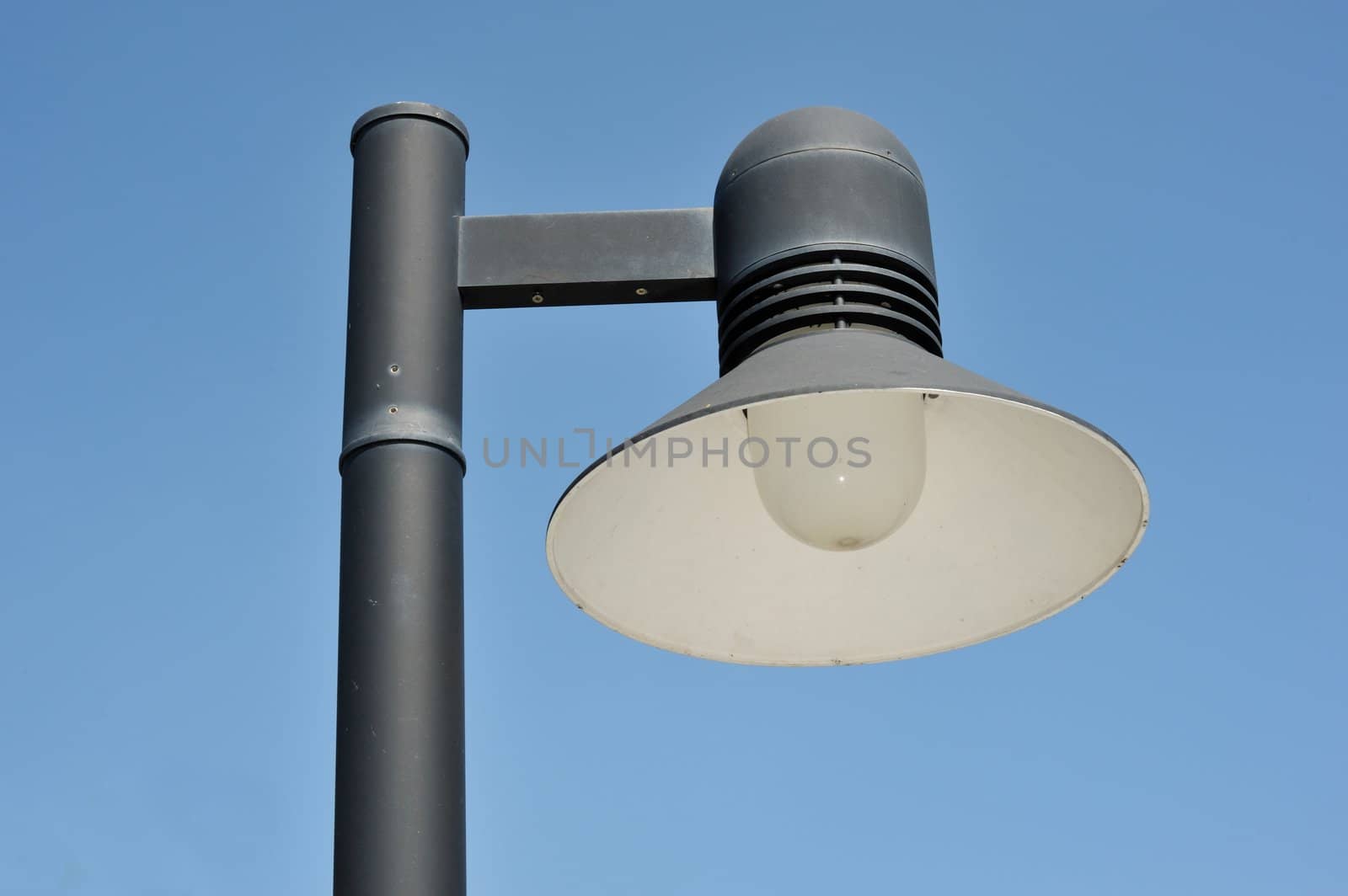 Streetlight isolated in sunny day background.