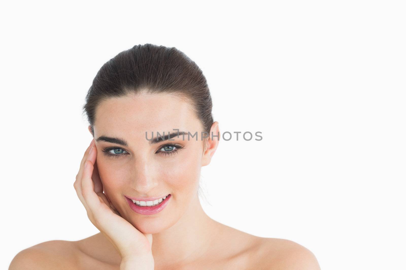 Glamorous woman leaning her head on a hand