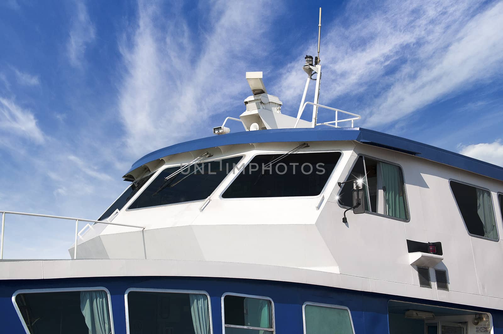 Detail of boat moored at the harbor and blue sky