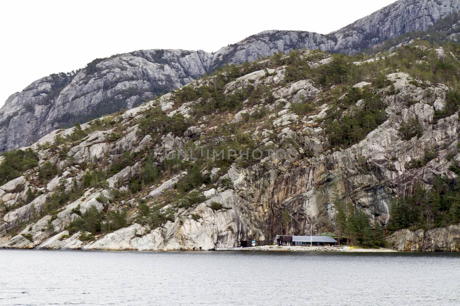 steep rock at coast in norway - horizontal image