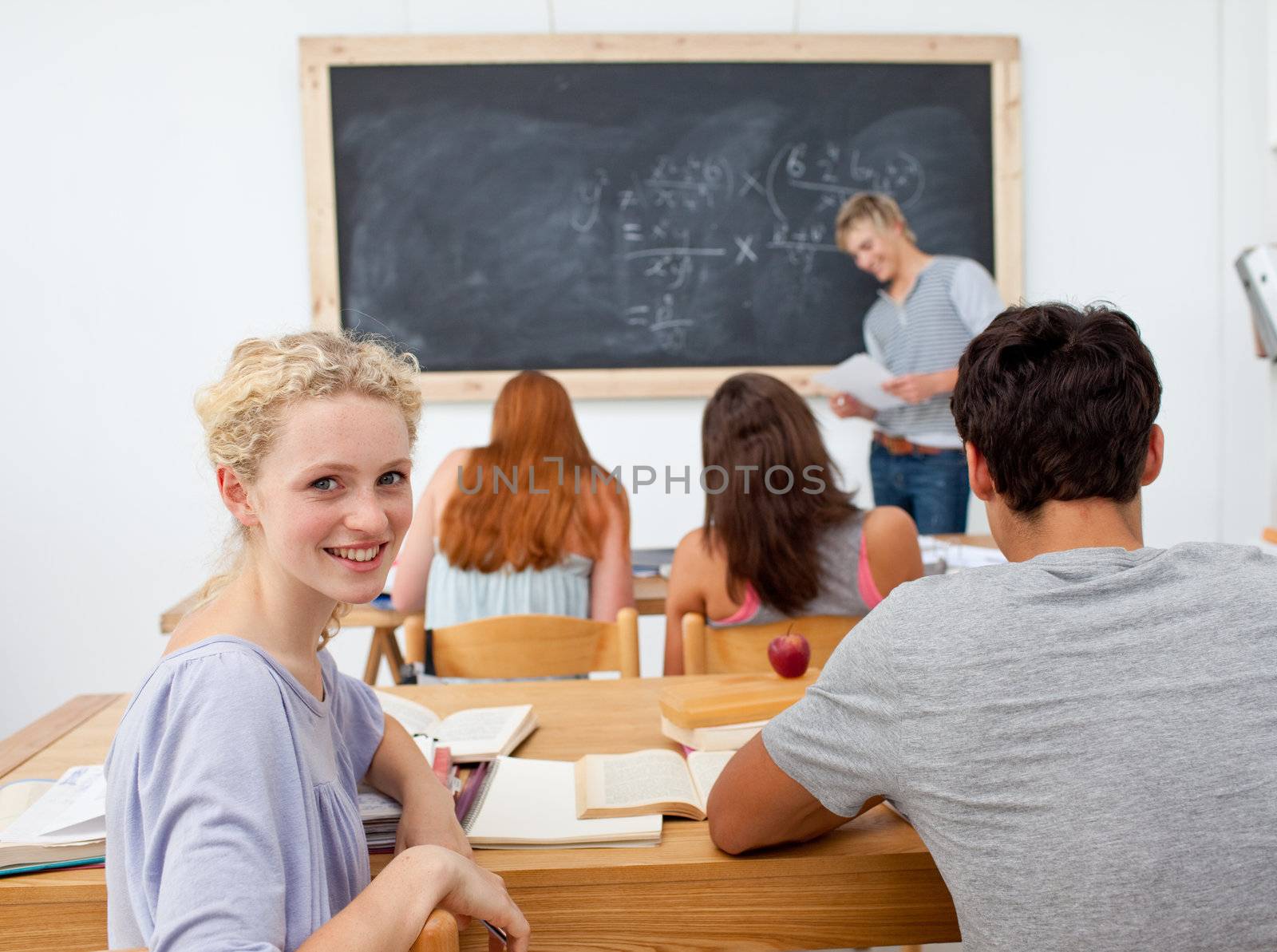 Teenagers studying in the high school by Wavebreakmedia