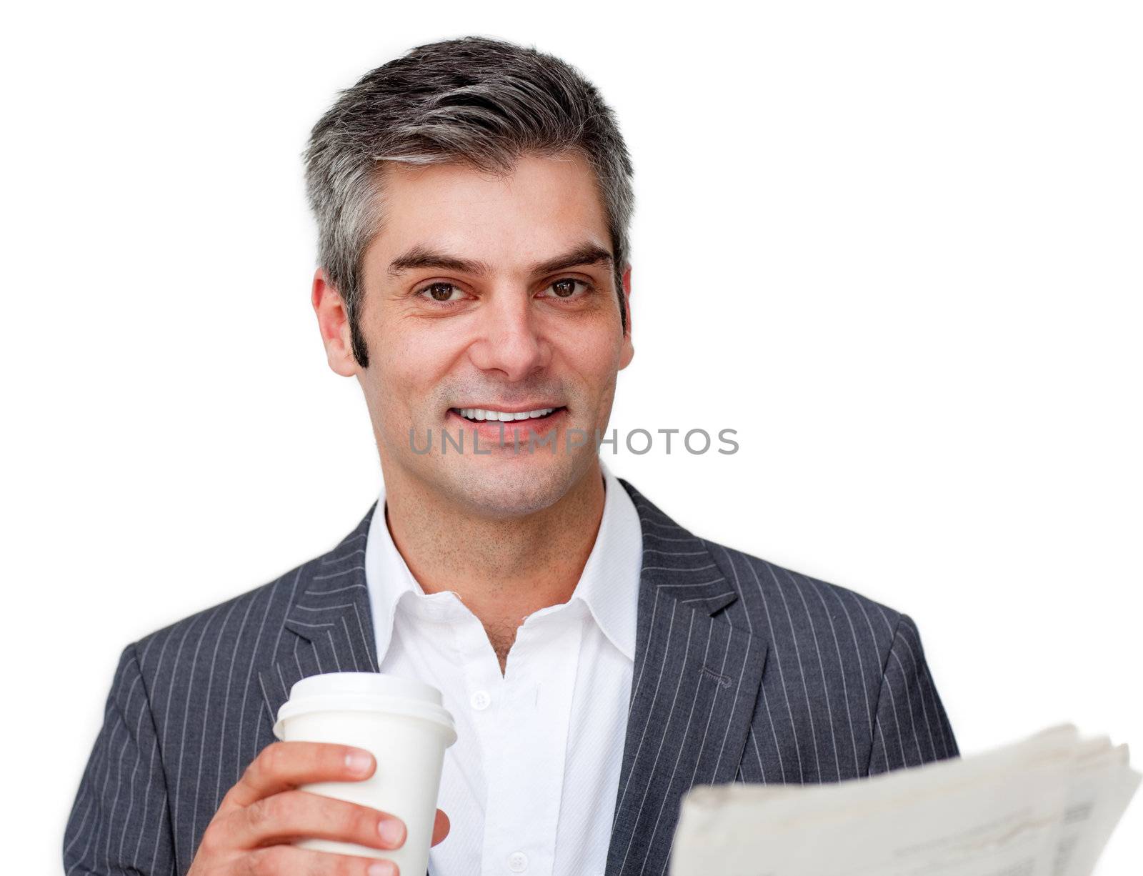 Attractive businessman reading a newspaper against a white background