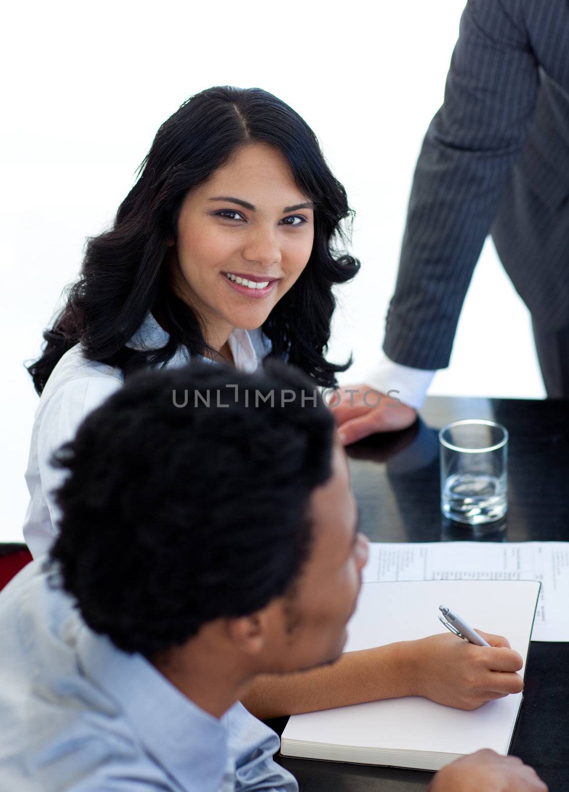 Ethnic businesswoman in a meeting by Wavebreakmedia