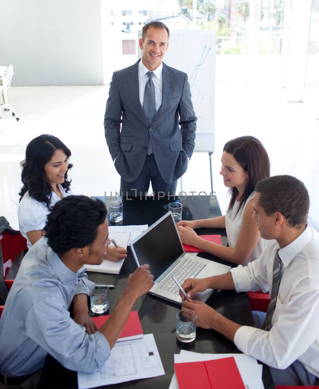 Business team studying a new business plan in office