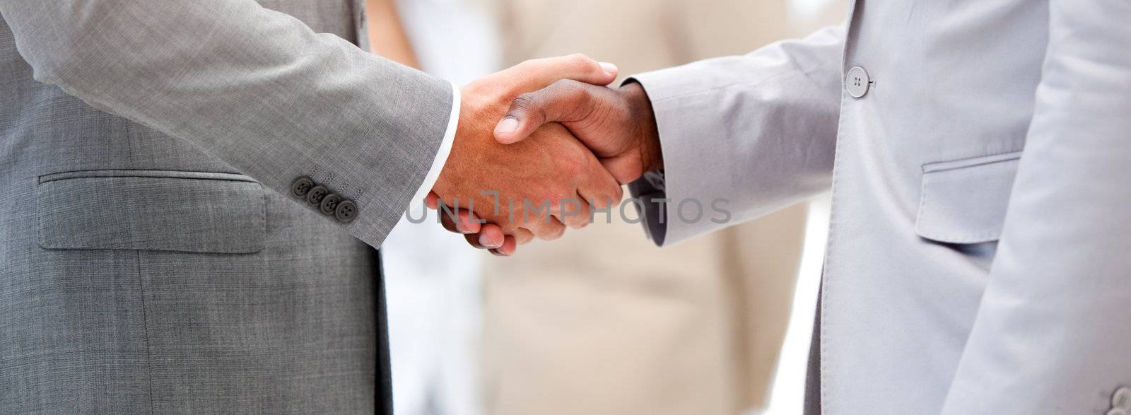 Close-up of a business agreement by shaking hand  by Wavebreakmedia