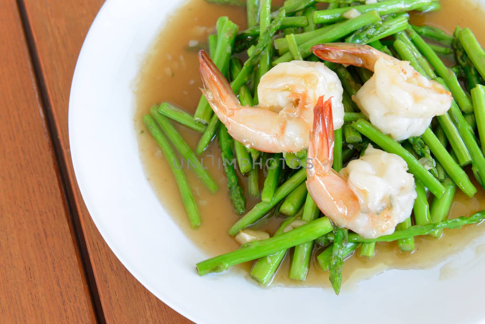 Fried shrimp with asparagus is a kind of Thai cuisine  It is not spicy