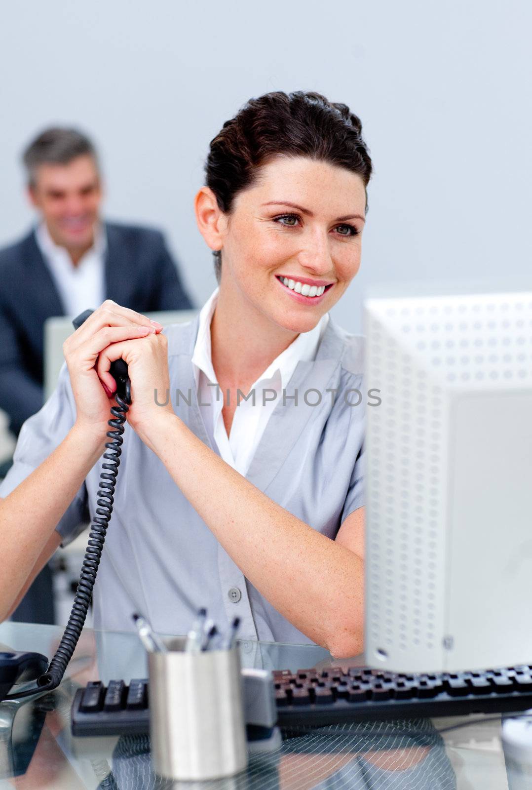 Charming business woman on phone by Wavebreakmedia