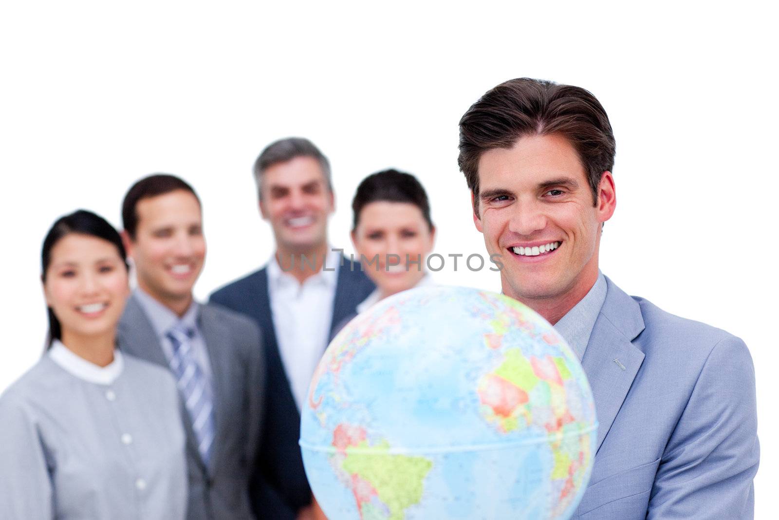 Young manager and his team holding a terrestrial globe against a white background