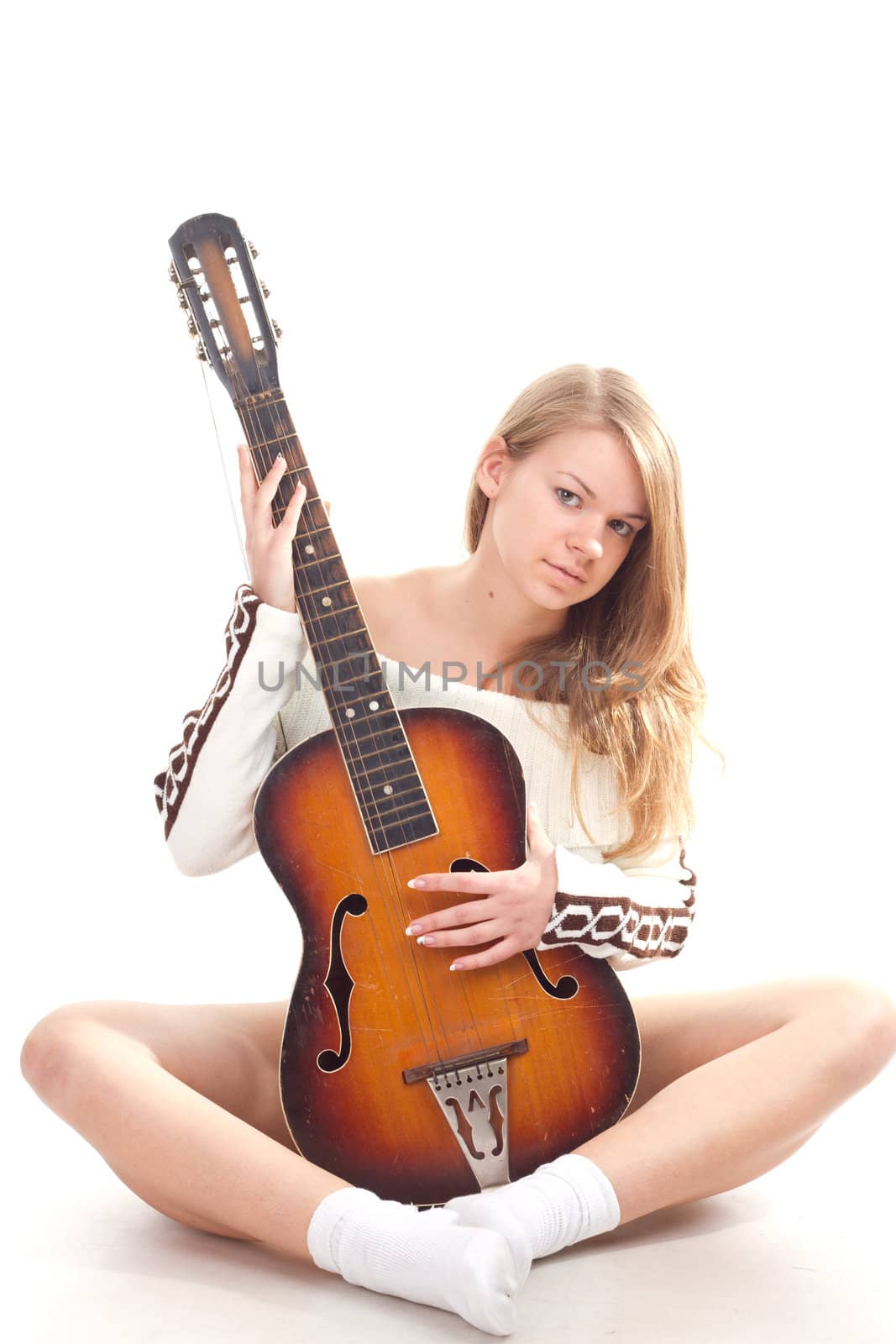 Beautiful girl in a sweater with guitar by victosha