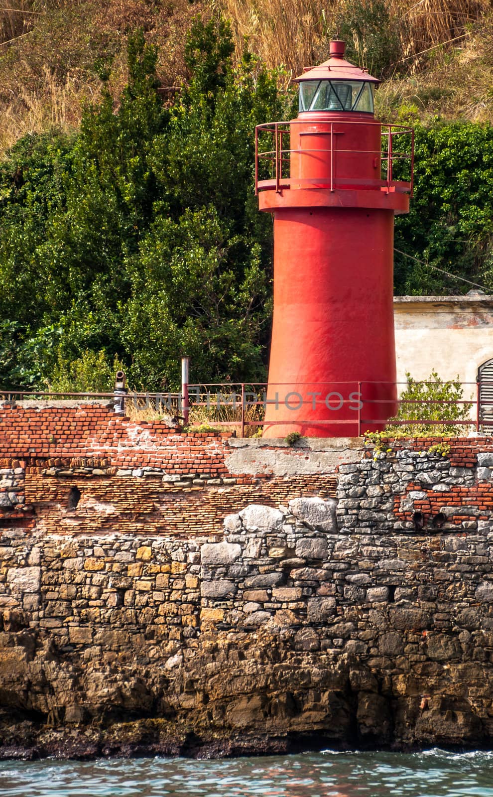 small red lighthouse by rigamondis