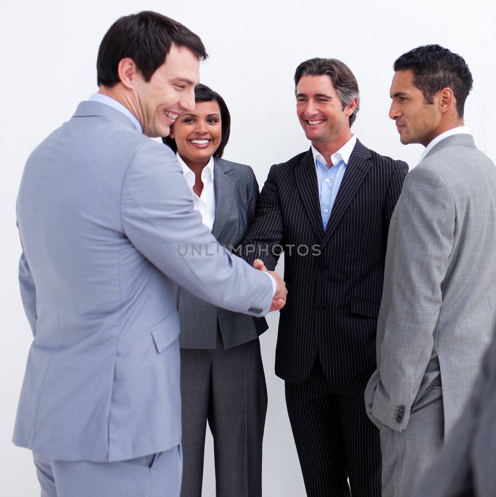Business people greeting each other by Wavebreakmedia