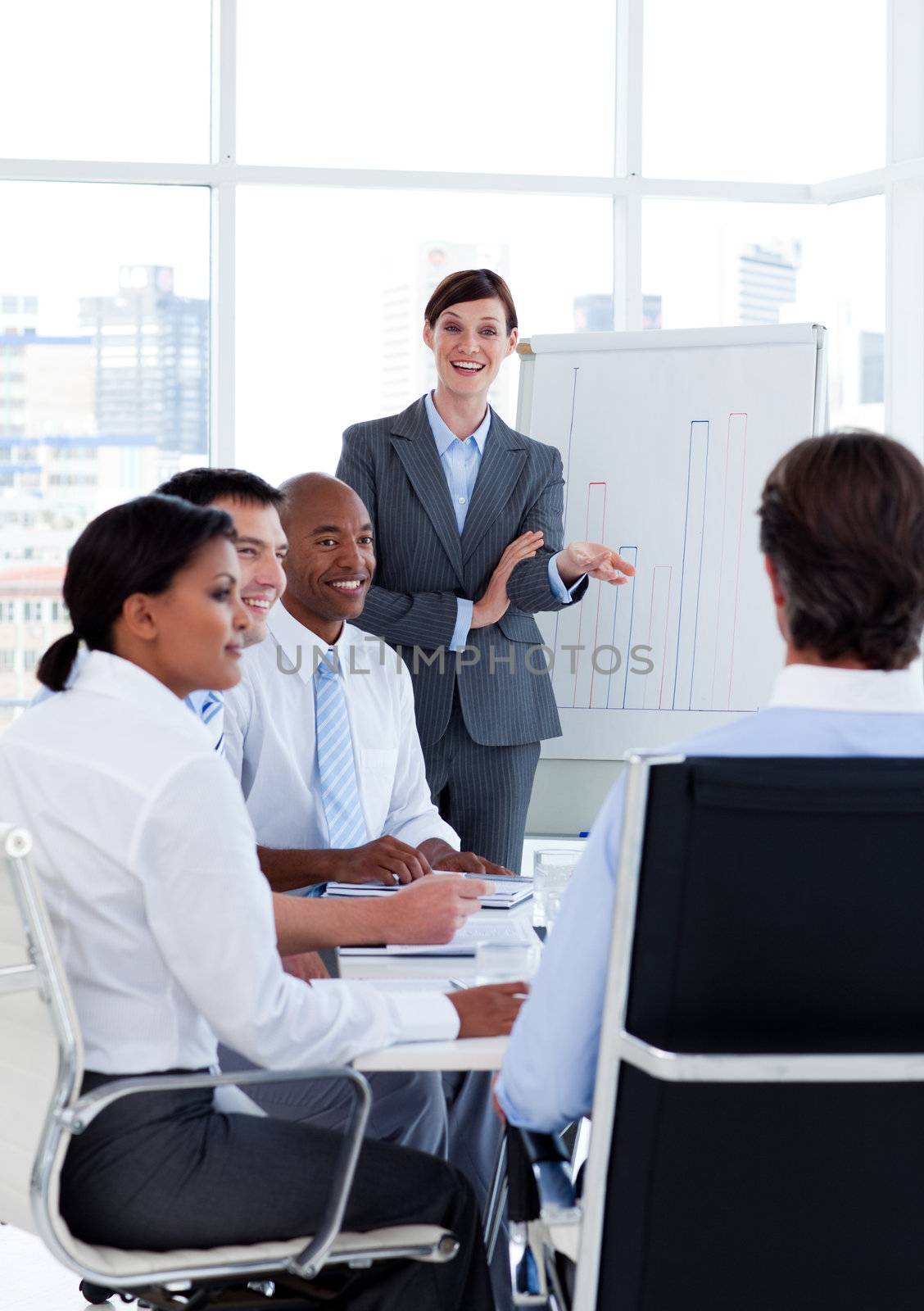 Portrait of business people discussing a new strategy at a meeting
