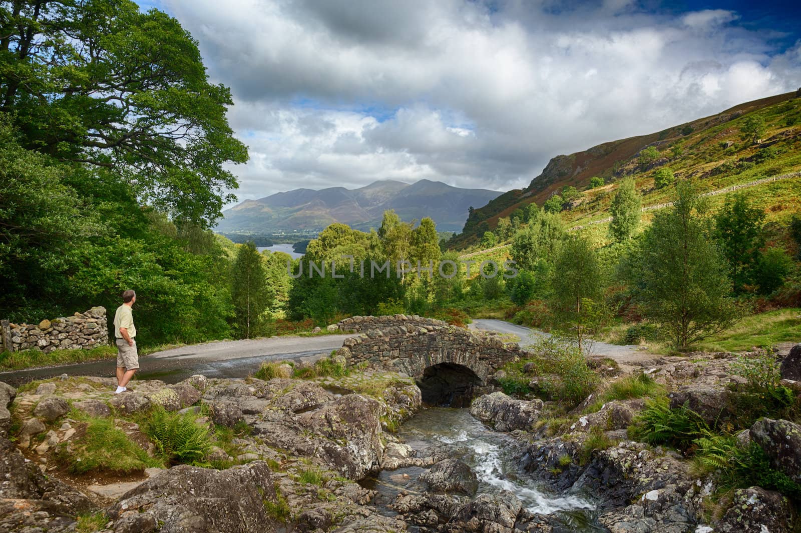 Ashness Bridge over small stream in Lake District by steheap