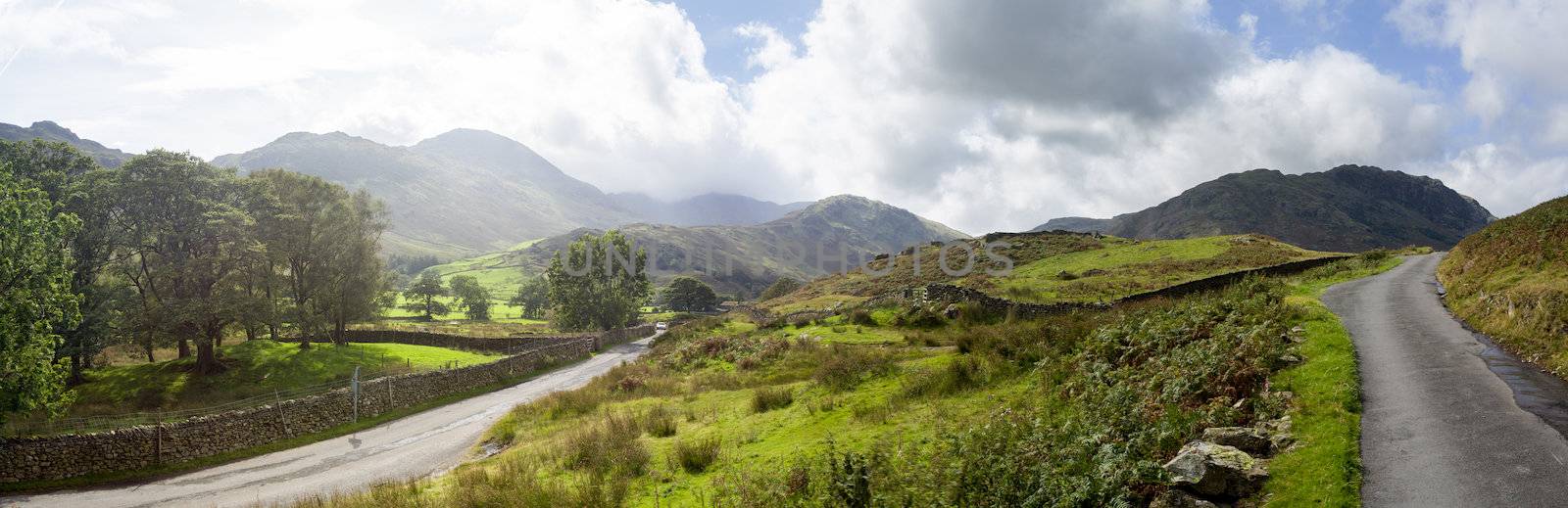 Road meet a junction in English Lake District by steheap