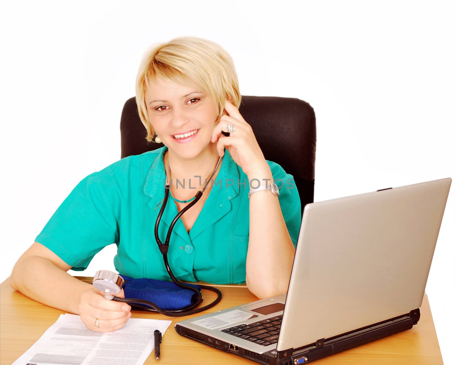 Female doctor with laptop and blood pressure device