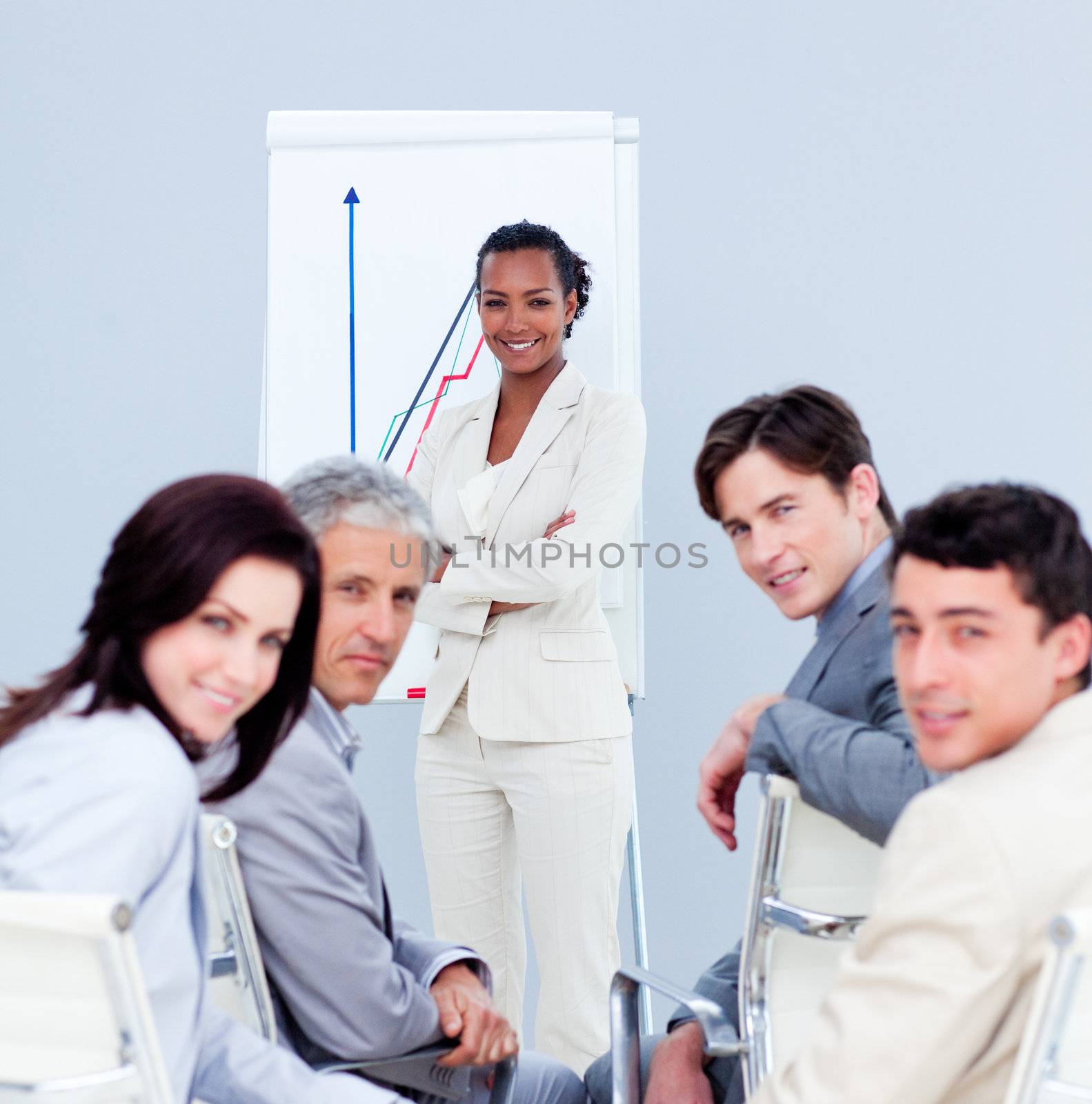 Multi-ethnic business people at a presentation in the office