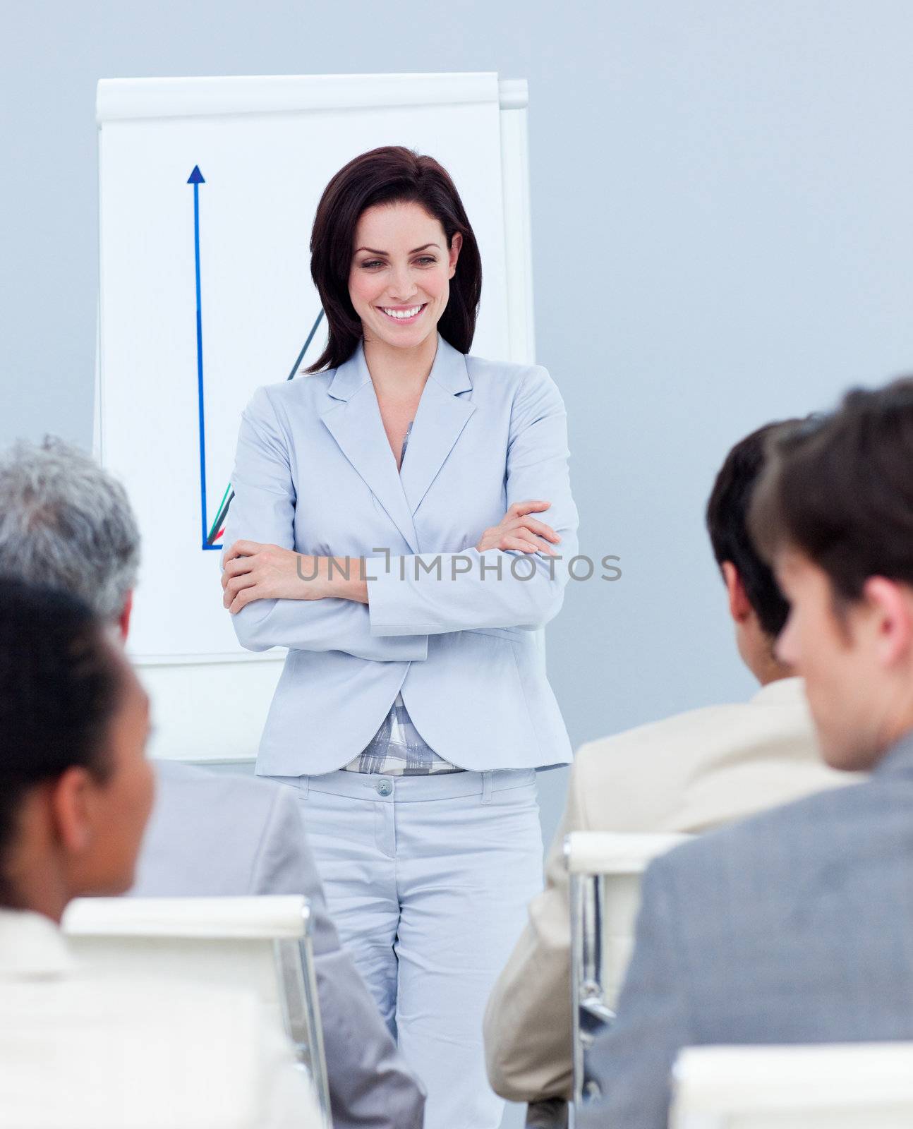 Charming businesswoman doing a presentation to her team