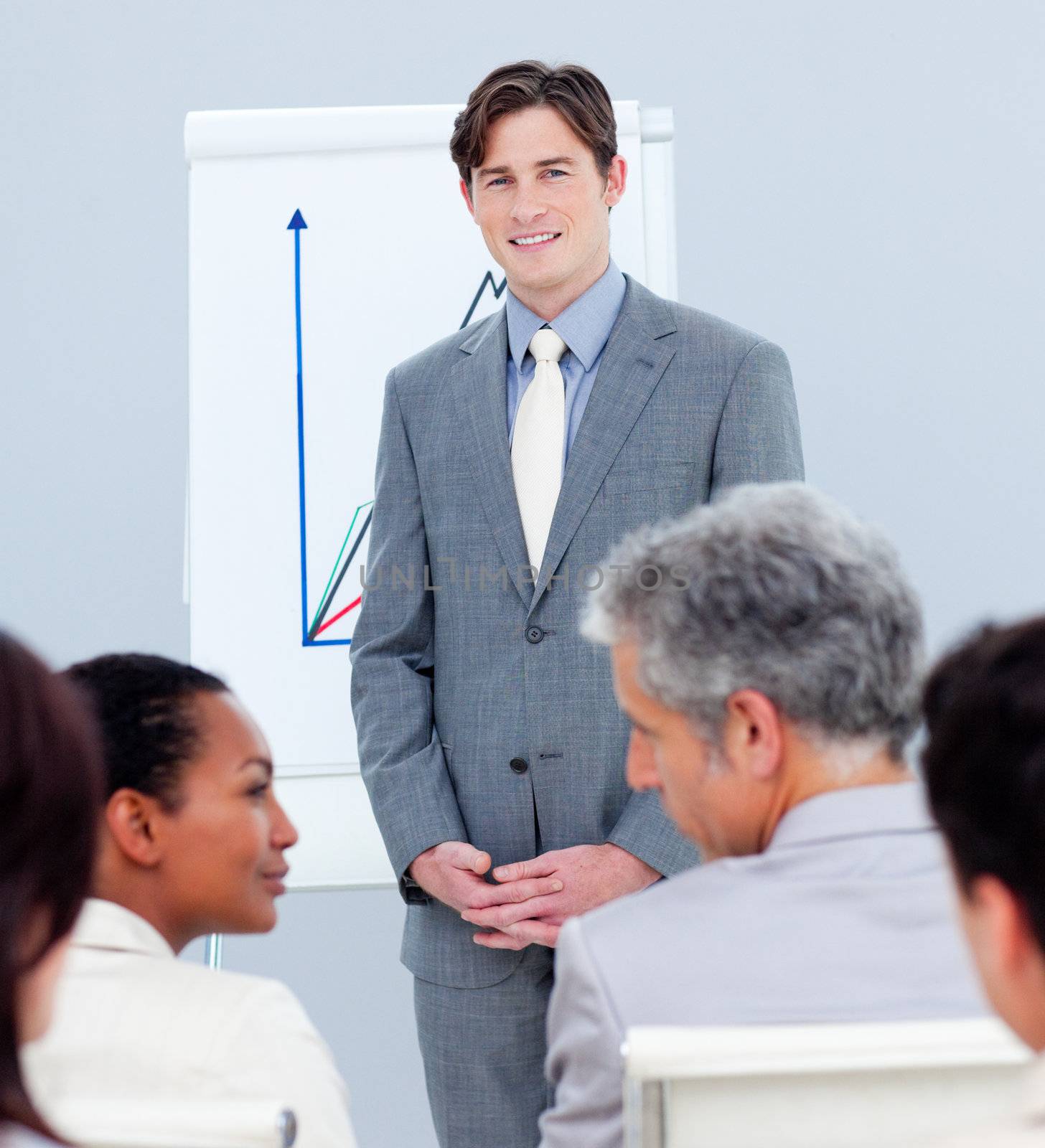 Confident businessman doing a presentation by Wavebreakmedia