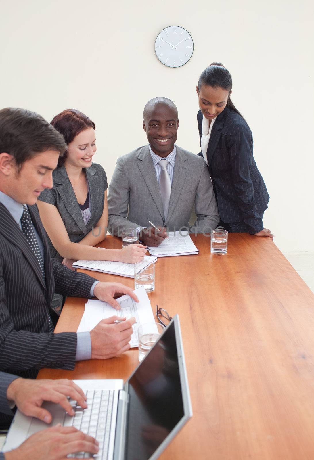 Business people working together in a meeting by Wavebreakmedia