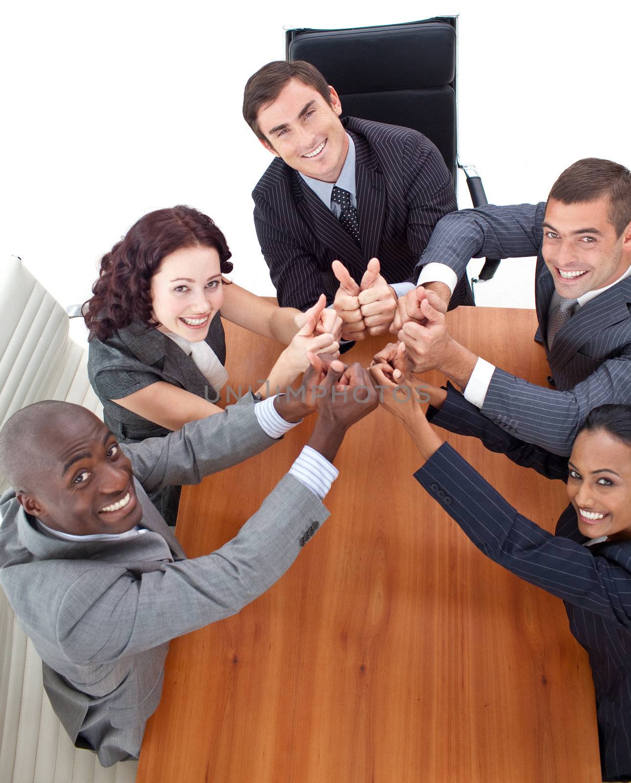 High view of happy busines people with thumbs up in a meeting