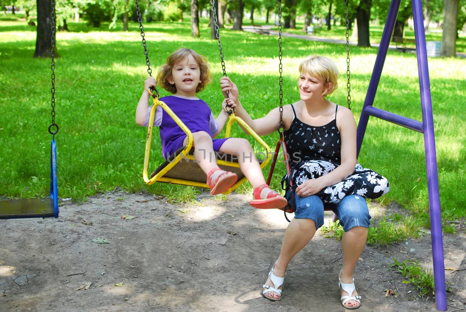 Mother and daughter in the playground