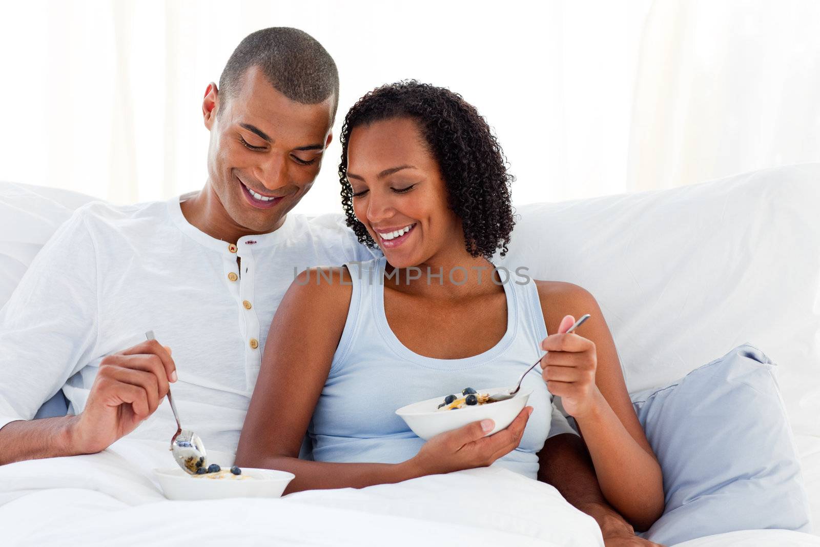Romantic couple having breakfast  by Wavebreakmedia