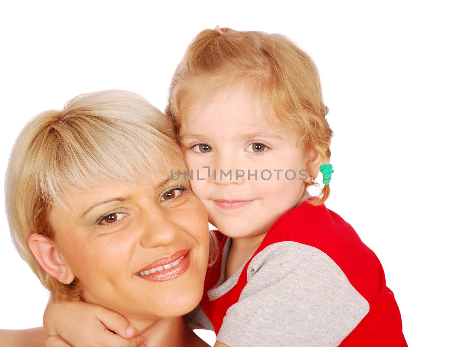 Beautiful mother and daughter studio shot by goce