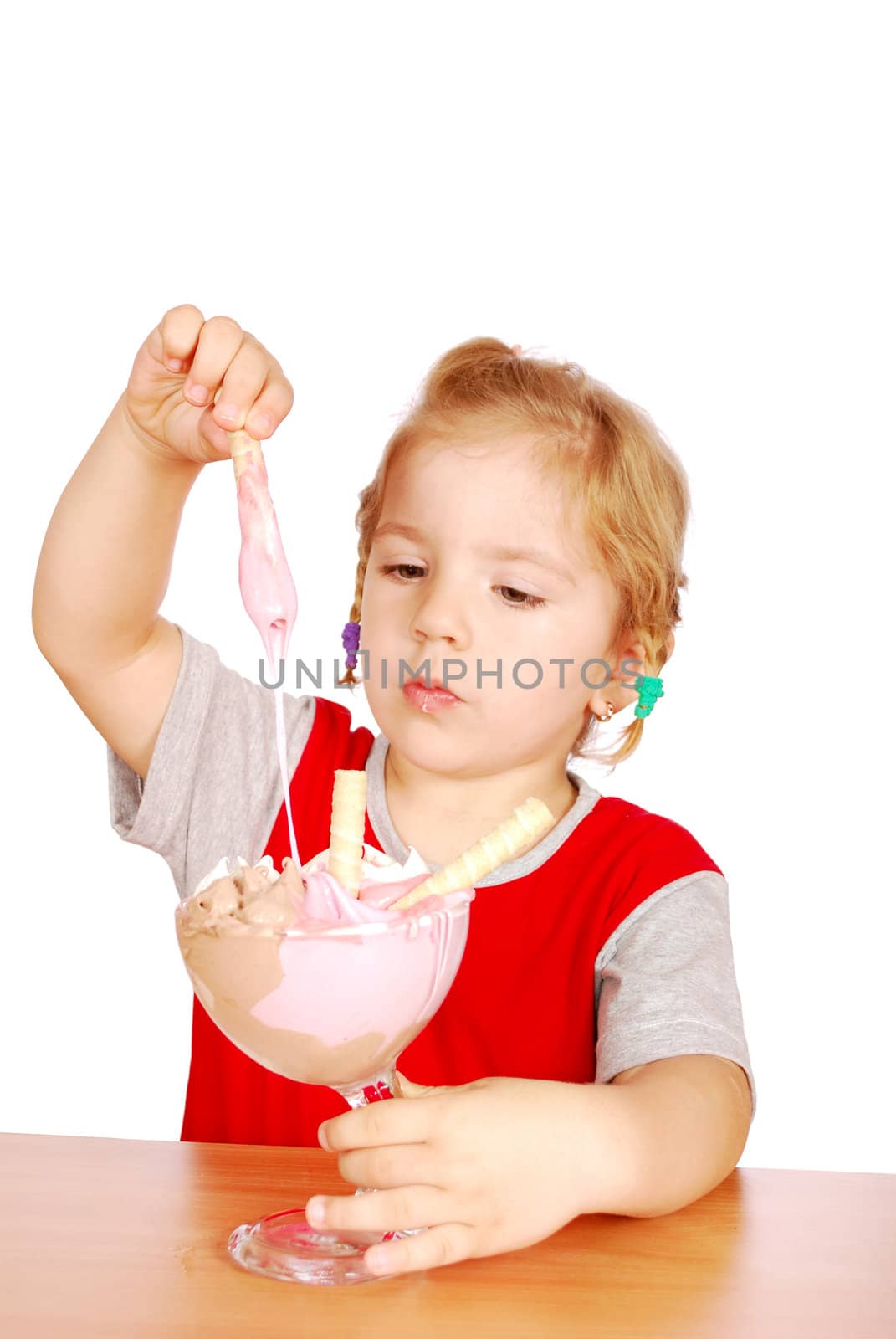 Beauty little girl with ice cream cup studio shot