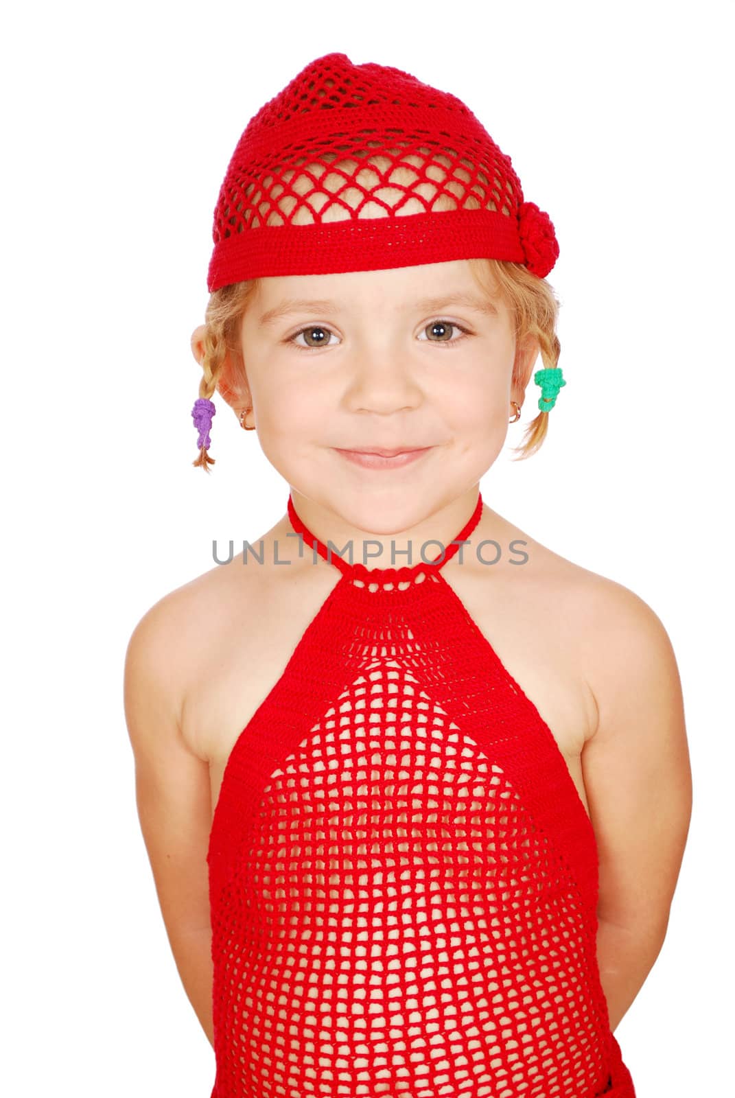 Beauty little girl in red knitted hat and dress