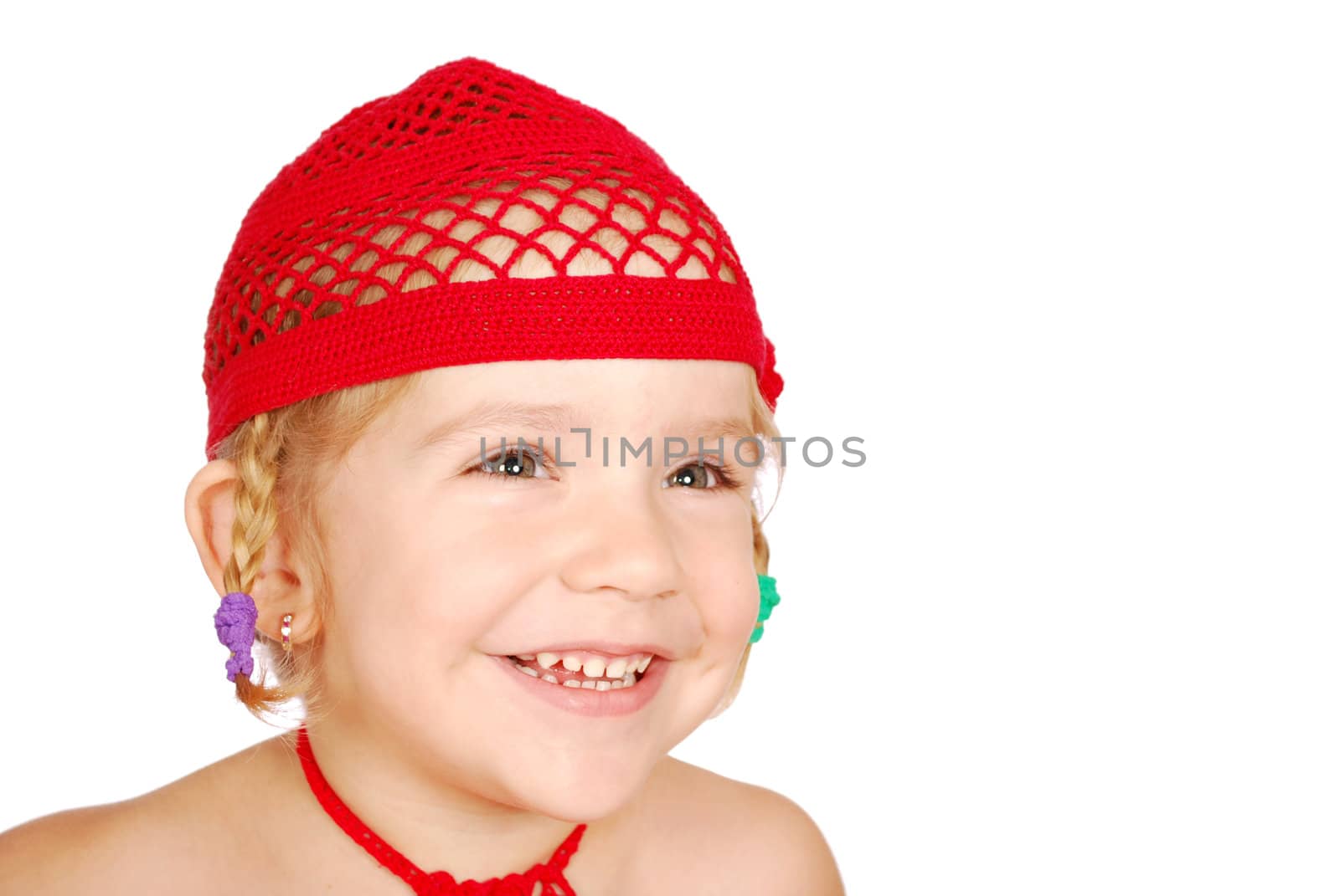 Little girl with red knitted hat studio shot