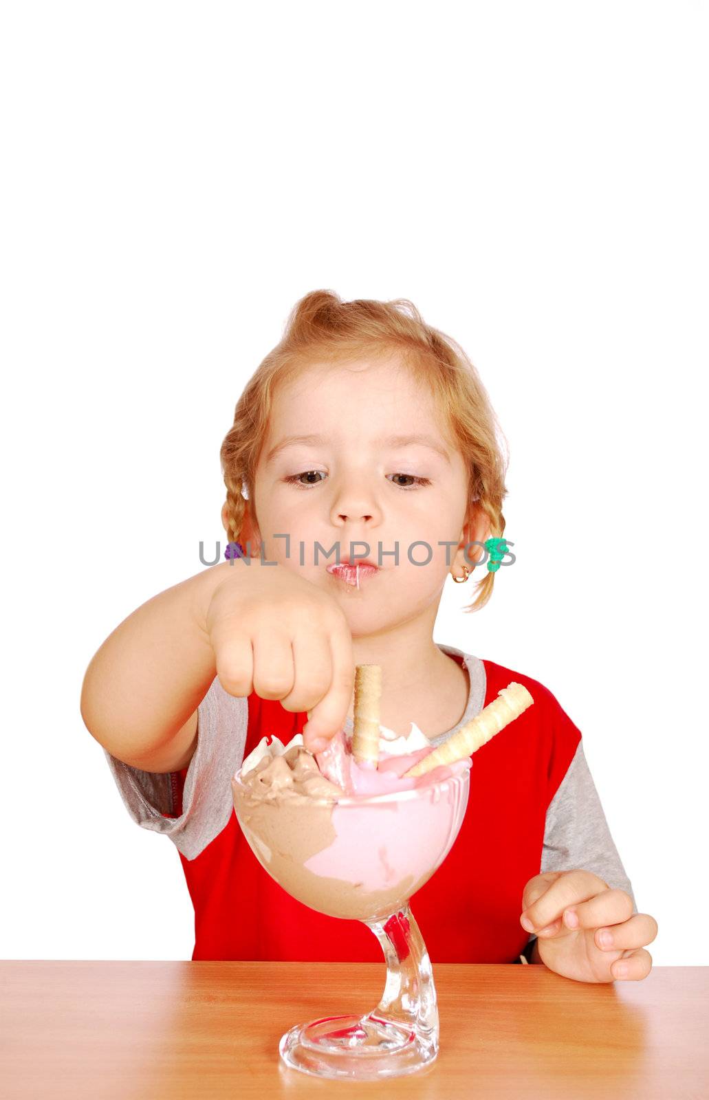 Beauty little girl enjoy in ice cream studio shot