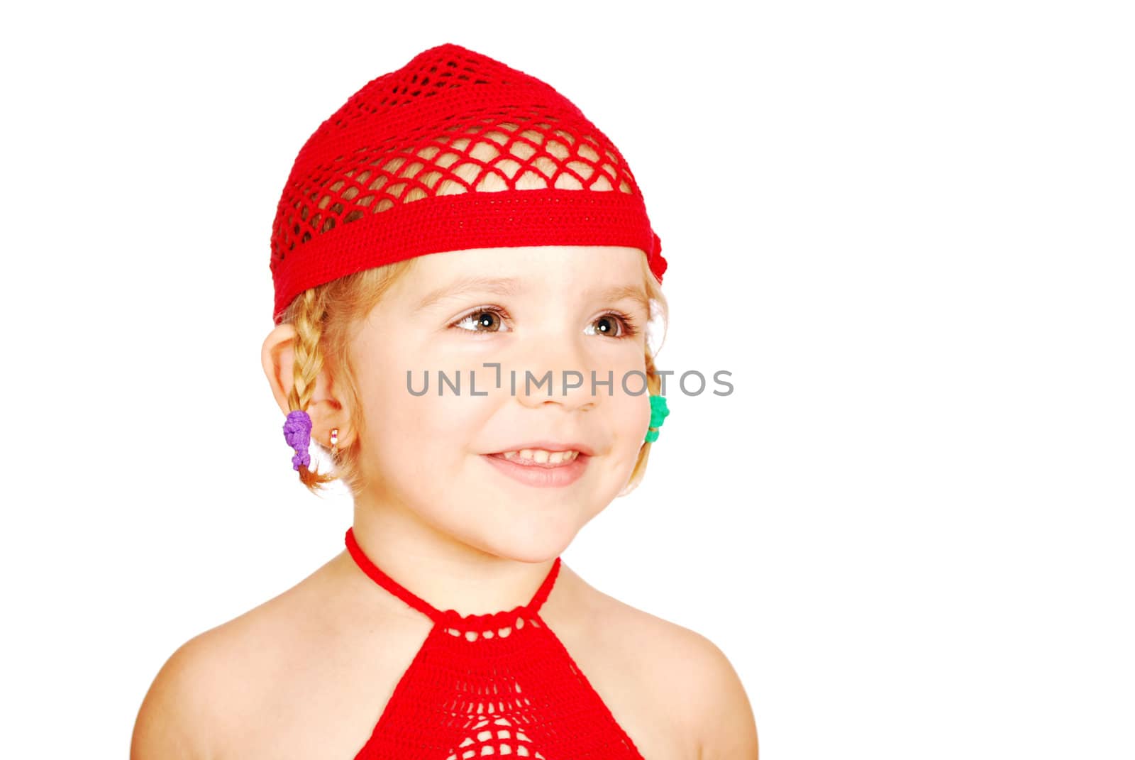Little girl with red knitted hat portrait